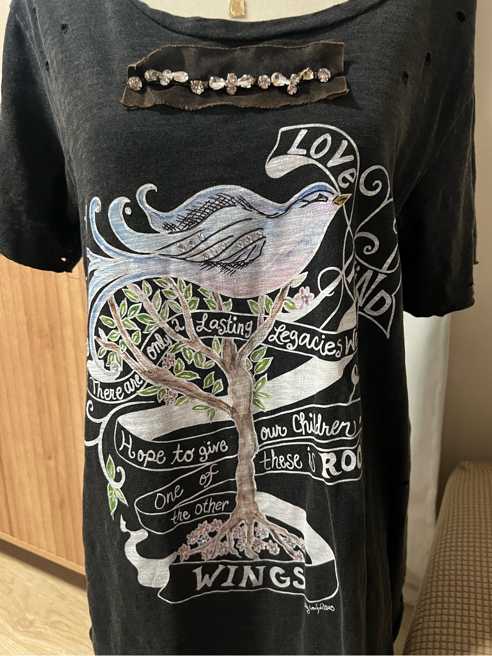 A Rare Bird Graphic Tee with Dove and Tree Design